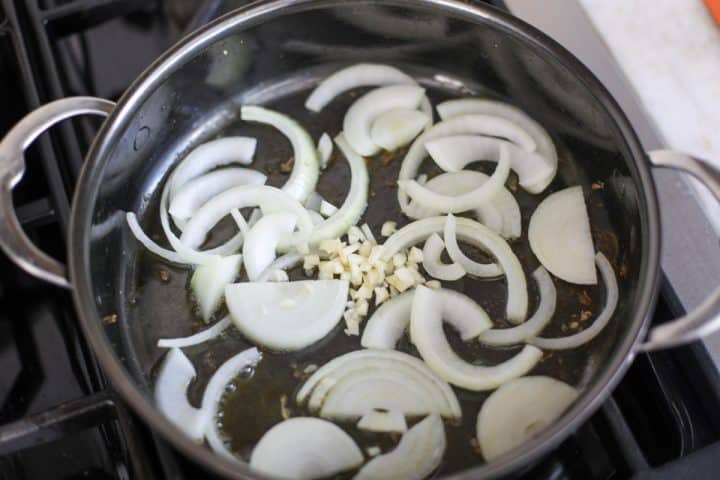onions and garlic in a pan with olive oil.