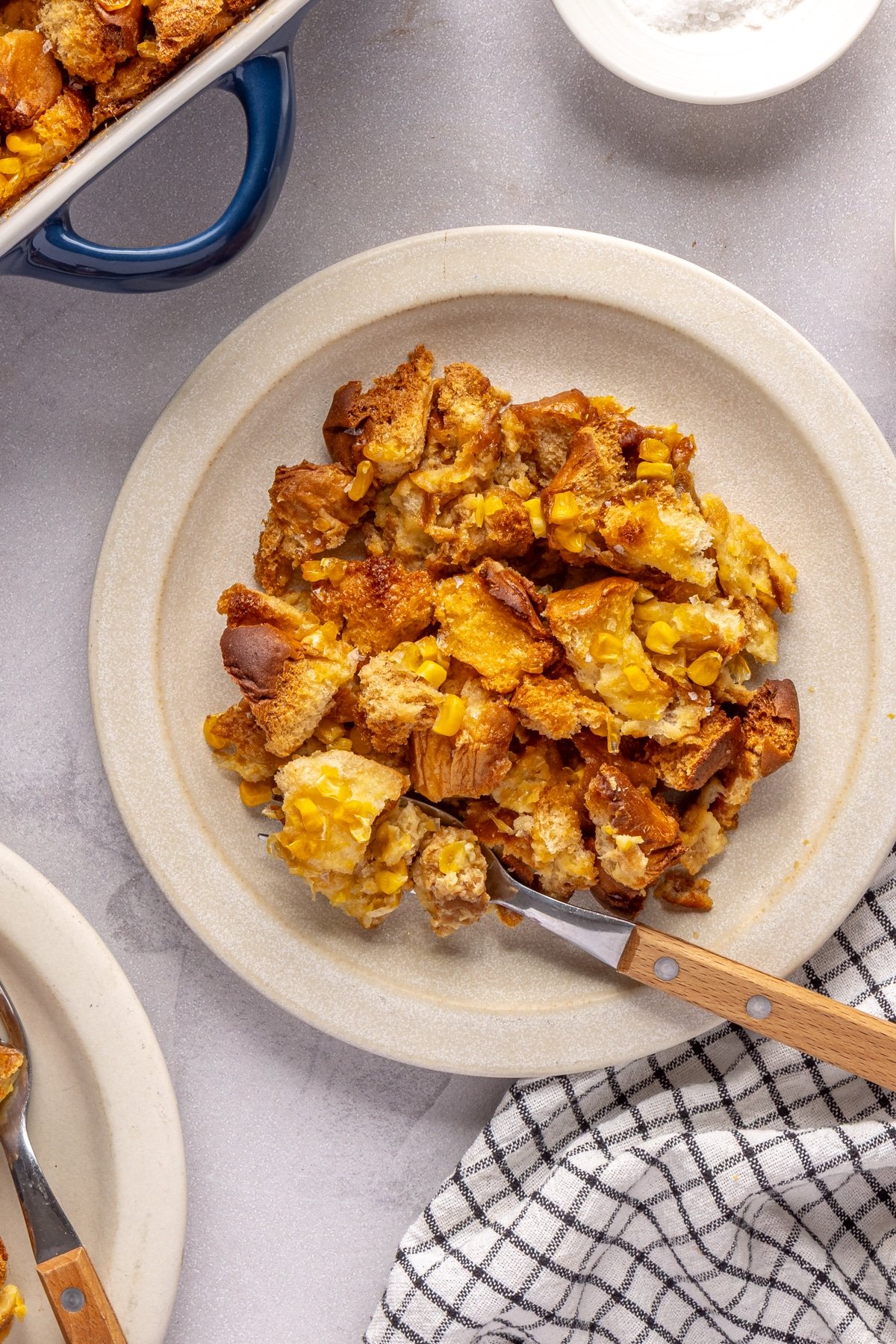 cornbread pudding on a plate.