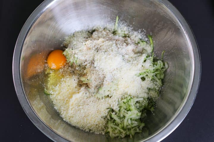 ingredients for meatballs in a bowl. 