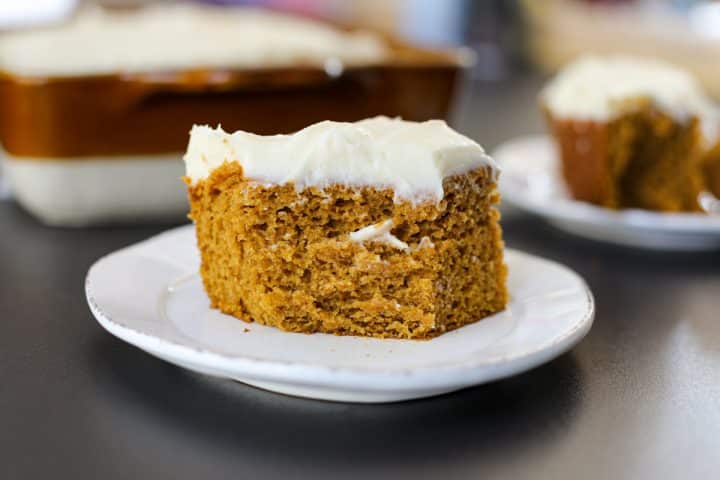 Slice of pumpkin cake on a plate.