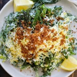 Ultimate Caesar Salad with grated egg, toasted panko and roasted asparagus.