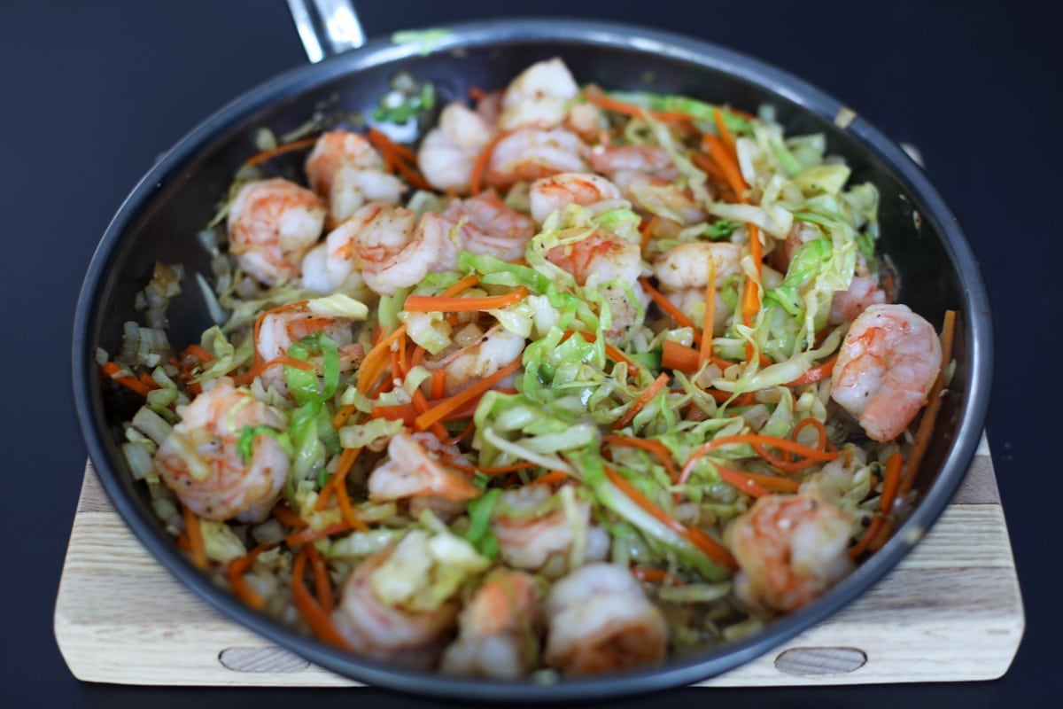 egg roll in a bowl in a pan. 