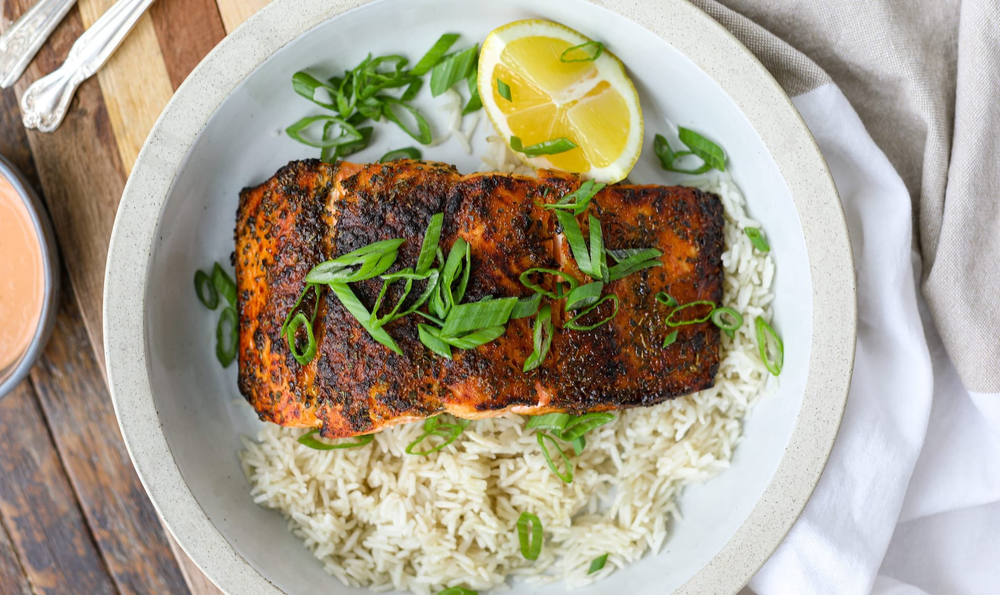 Blackened Air Fryer Salmon with Spicy Creamy Sauce - Healthyish Foods