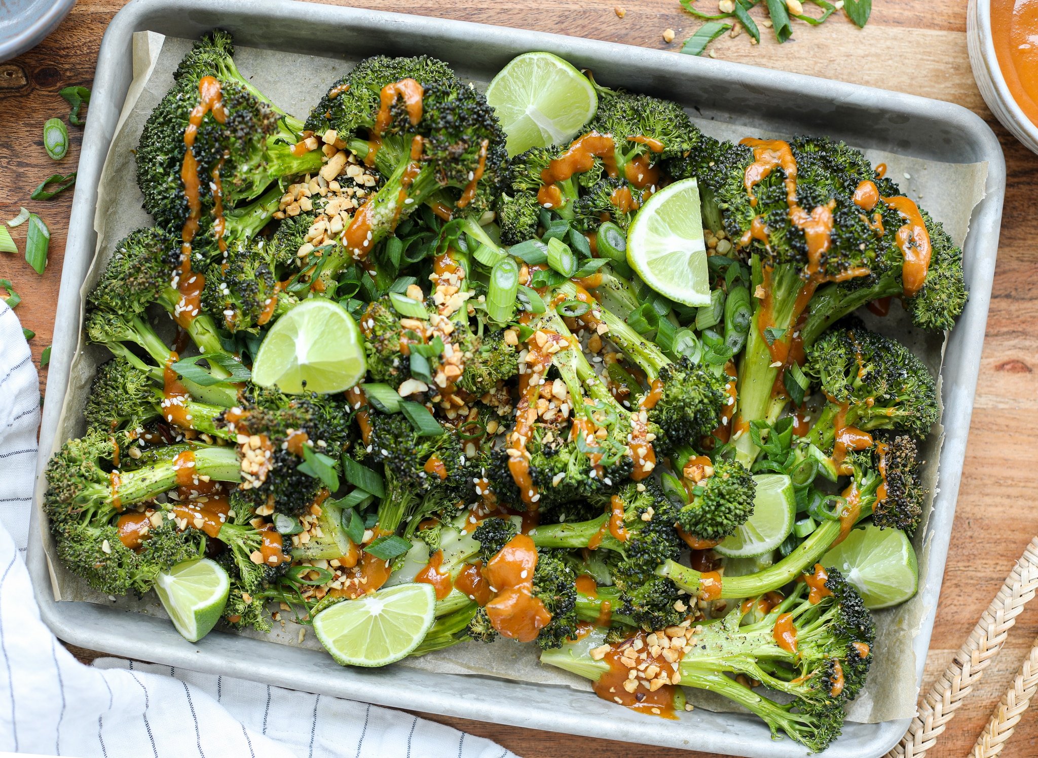 Asian Inspired Roasted Broccoli with Spicy Peanut Sauce - Healthyish Foods
