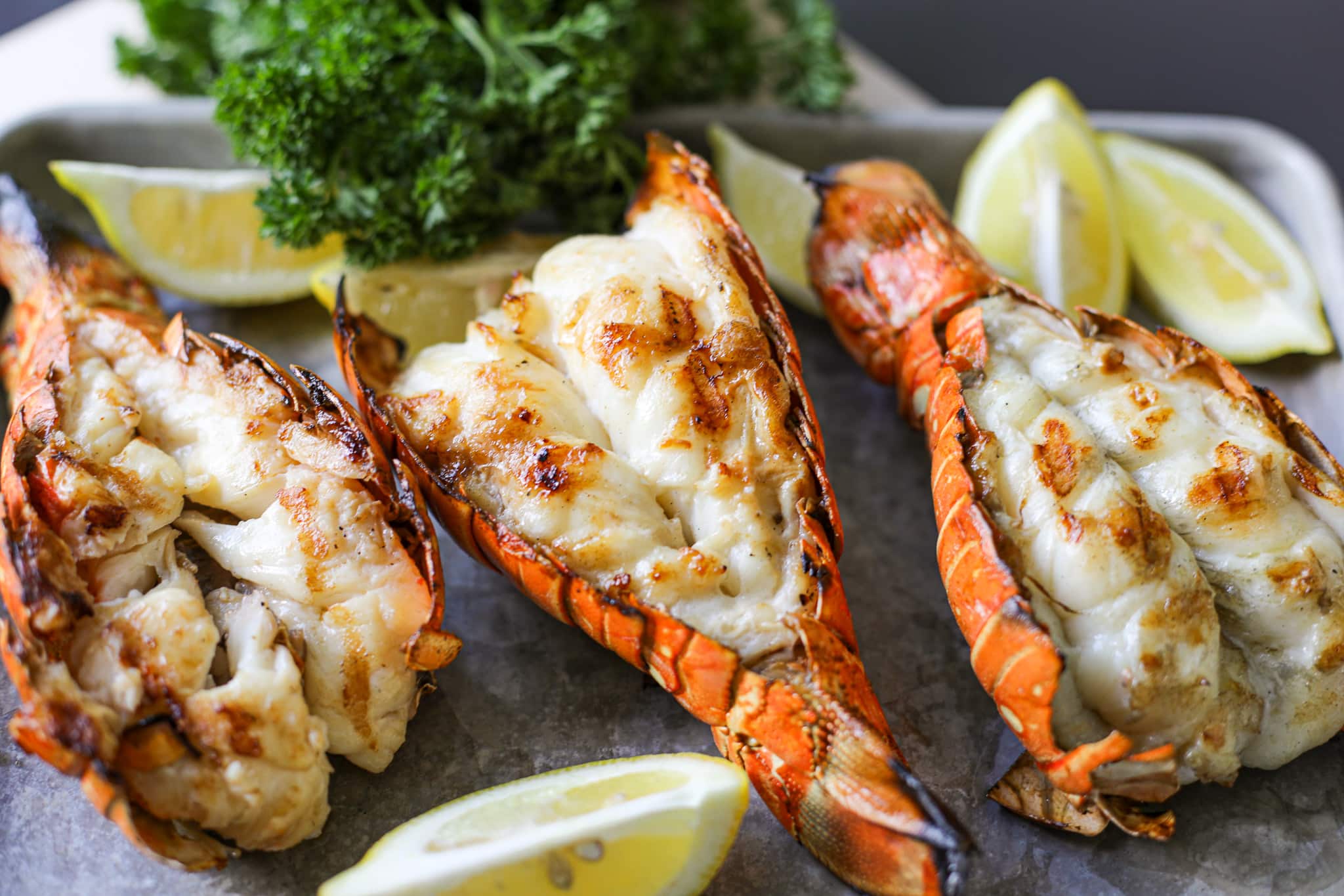 beauty shot of grilled lobster tail recipe - Grilled Lobster Tails Recipe - Healthyish Foods