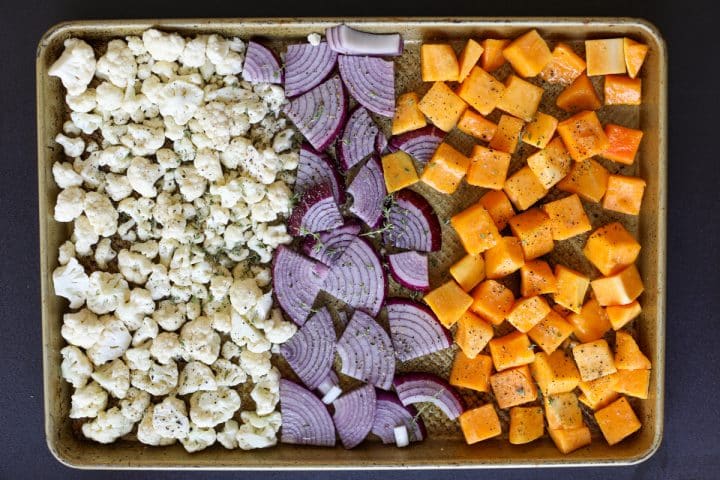 ingredients on a sheet tray before roasting.