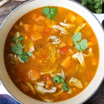 butternut squash and chicken soup in a dutch oven.