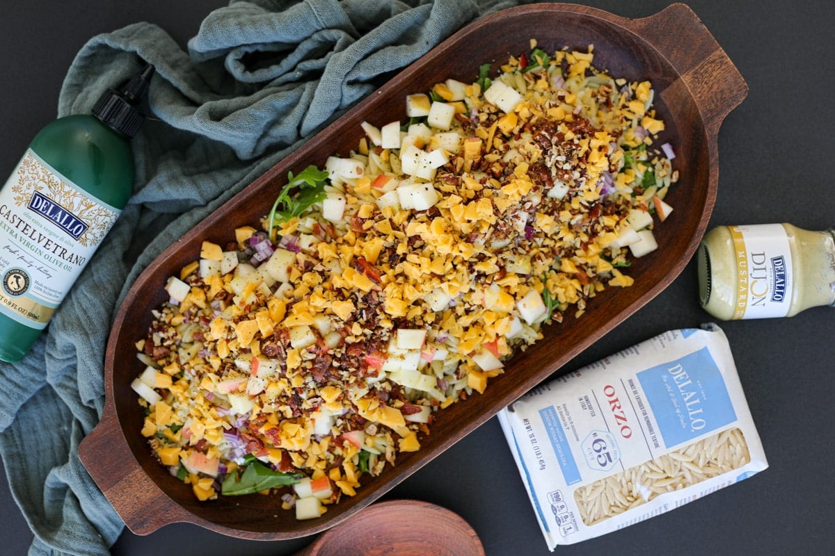 fall pasta salad in a wooden bowl. 