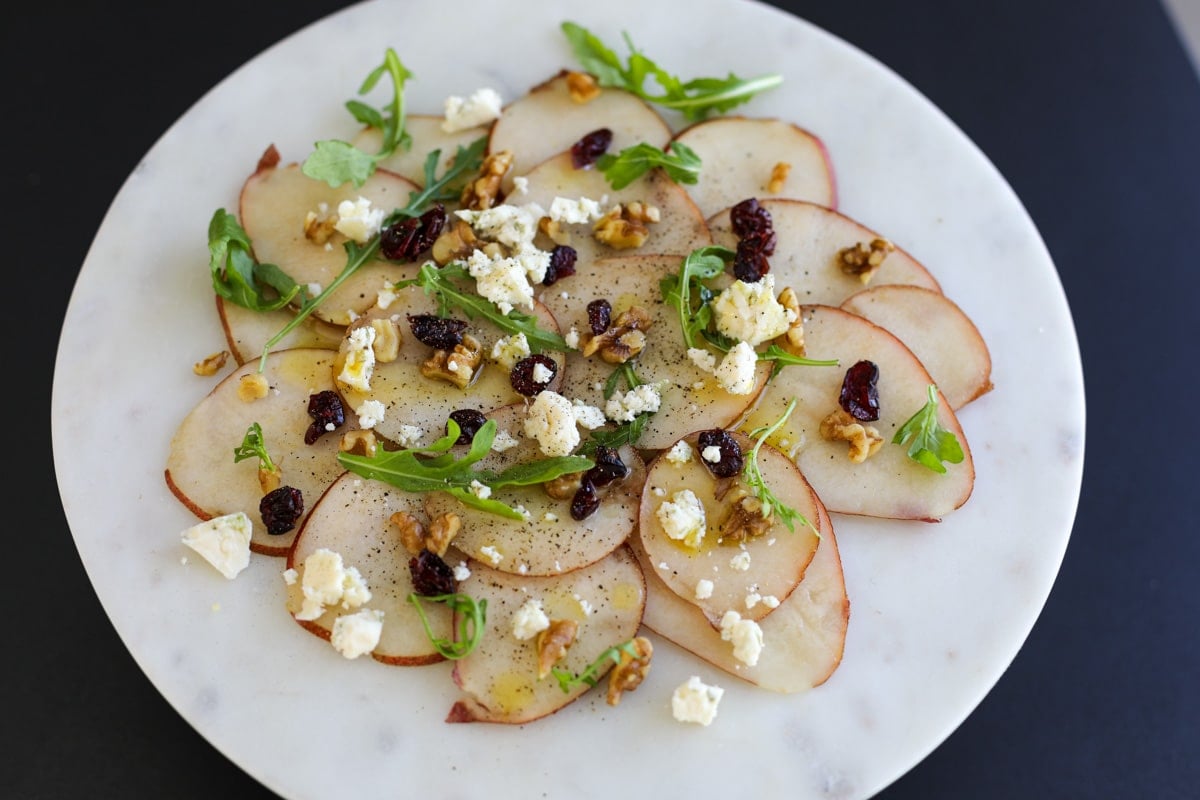 pear carpaccio on a plate.