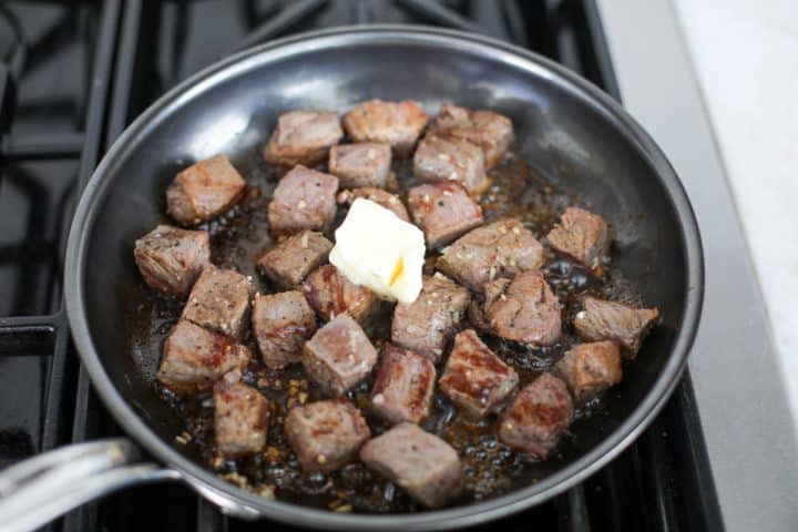 soy sauce, butter and garlic tossed with steak bites.