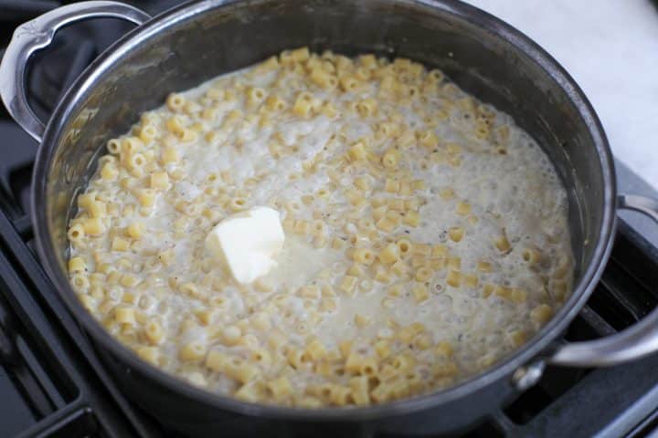 butter being added to the sauce.