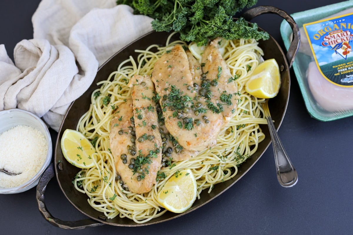 chicken piccata over pasta.