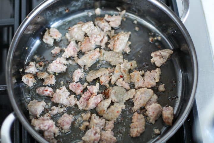ground sausage in a pan browning. 
