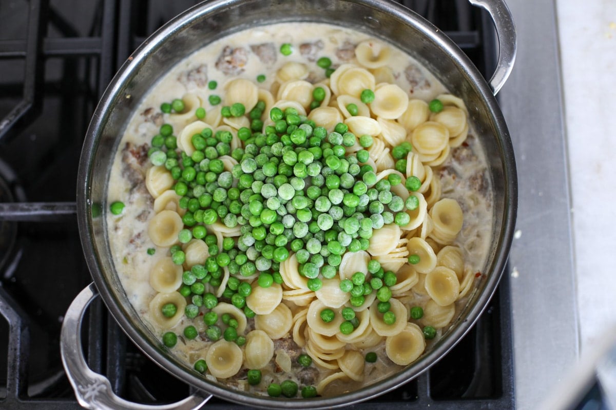 pasta and peas added to the creamy sausage sauce. 