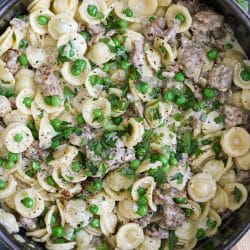 Creamy Orecchiette Sausage and Pea Pasta in a pan.
