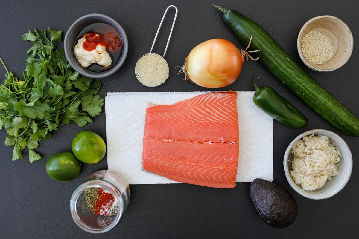 ingredients needed for spicy salmon burgers and toppings.