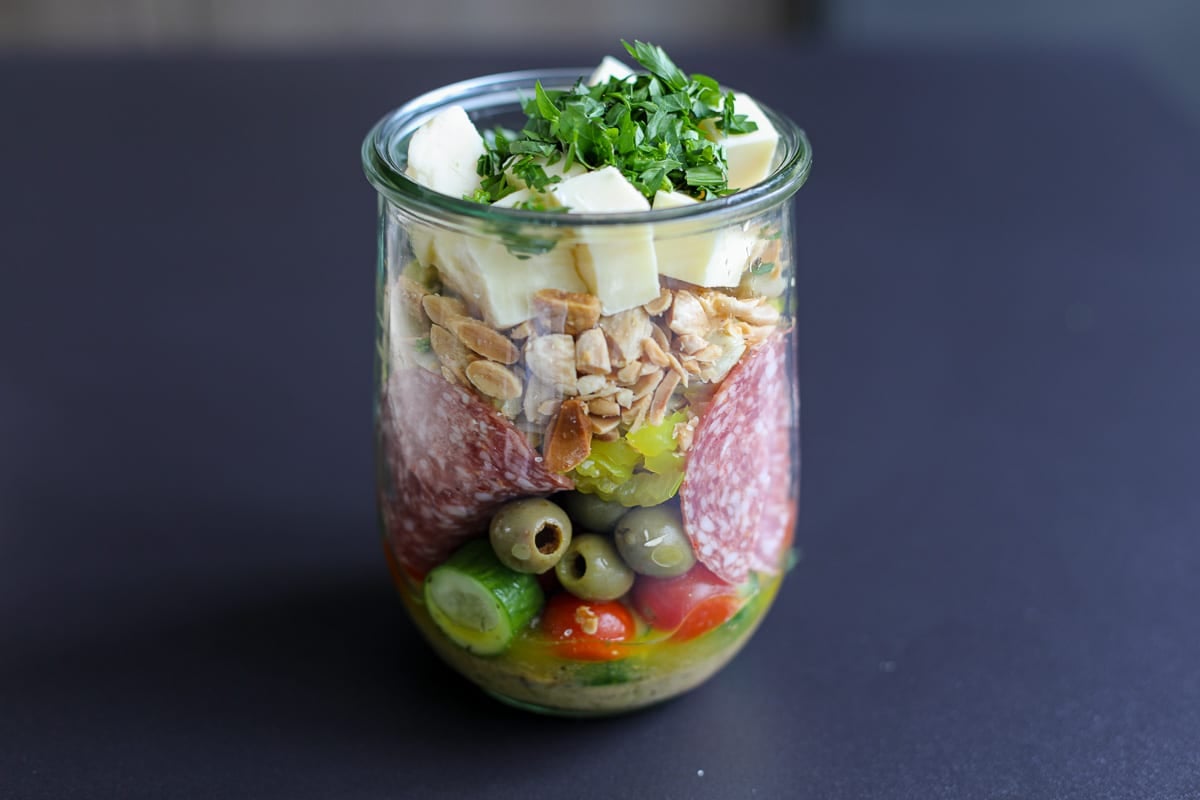 marinated charcuterie salad in a jar.