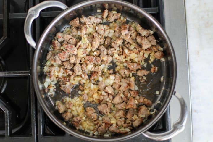 browned sausage in a hot pan.