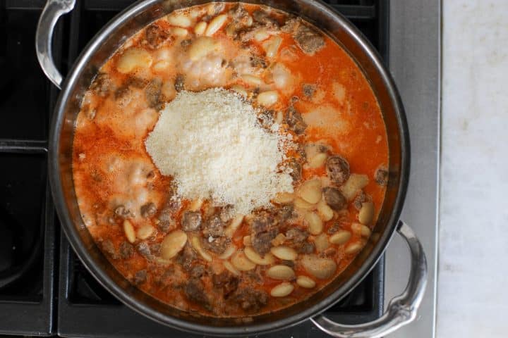 grated parmesan cheese added to the beans and sausage mixture.