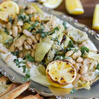 roasted artichokes and beans in a