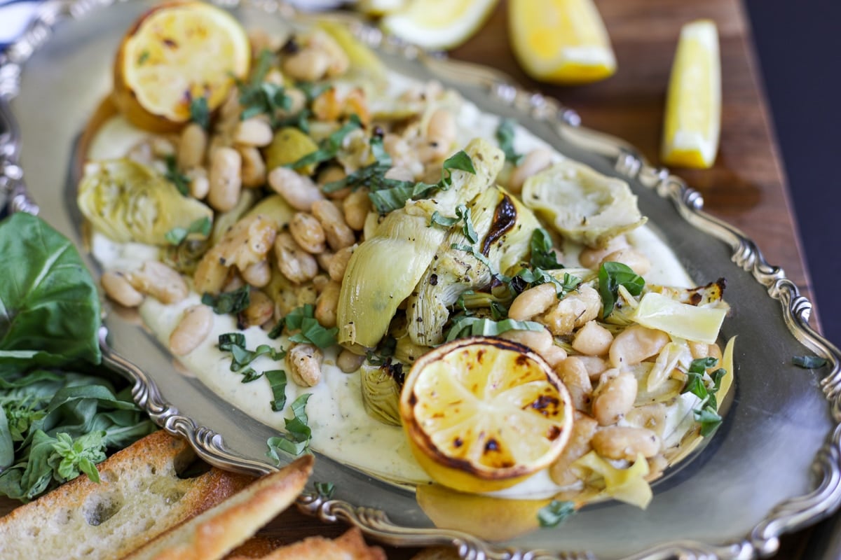 roasted artichokes and beans in a