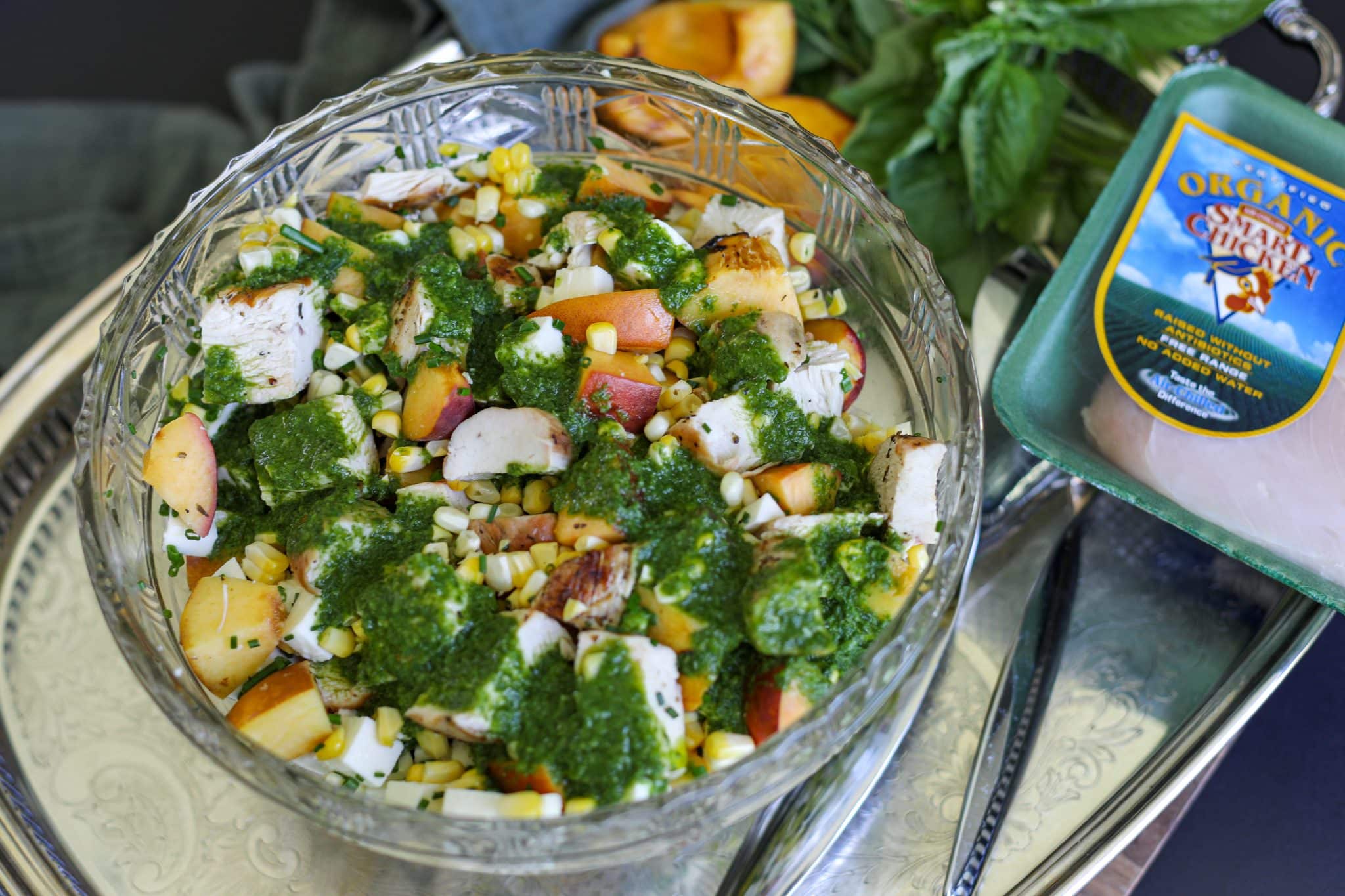 grilled salad in a bowl with packaging.