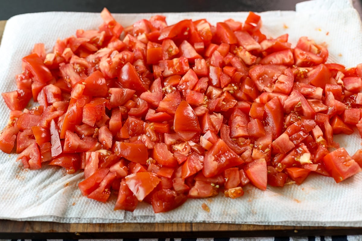 medium diced tomatoes on paper towel.