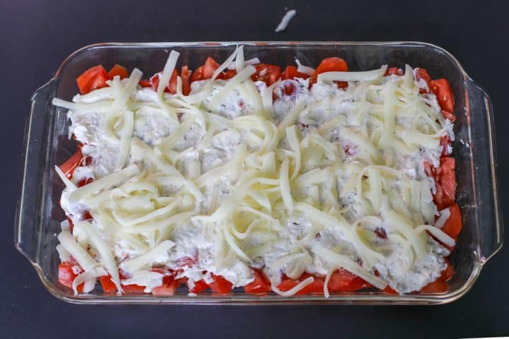 assembled tomato pie dip before baking.
