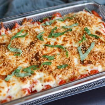 tomato pie dip appetizer fully dressed with panko and basil.