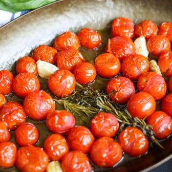 tomato confit in a roasting pan.
