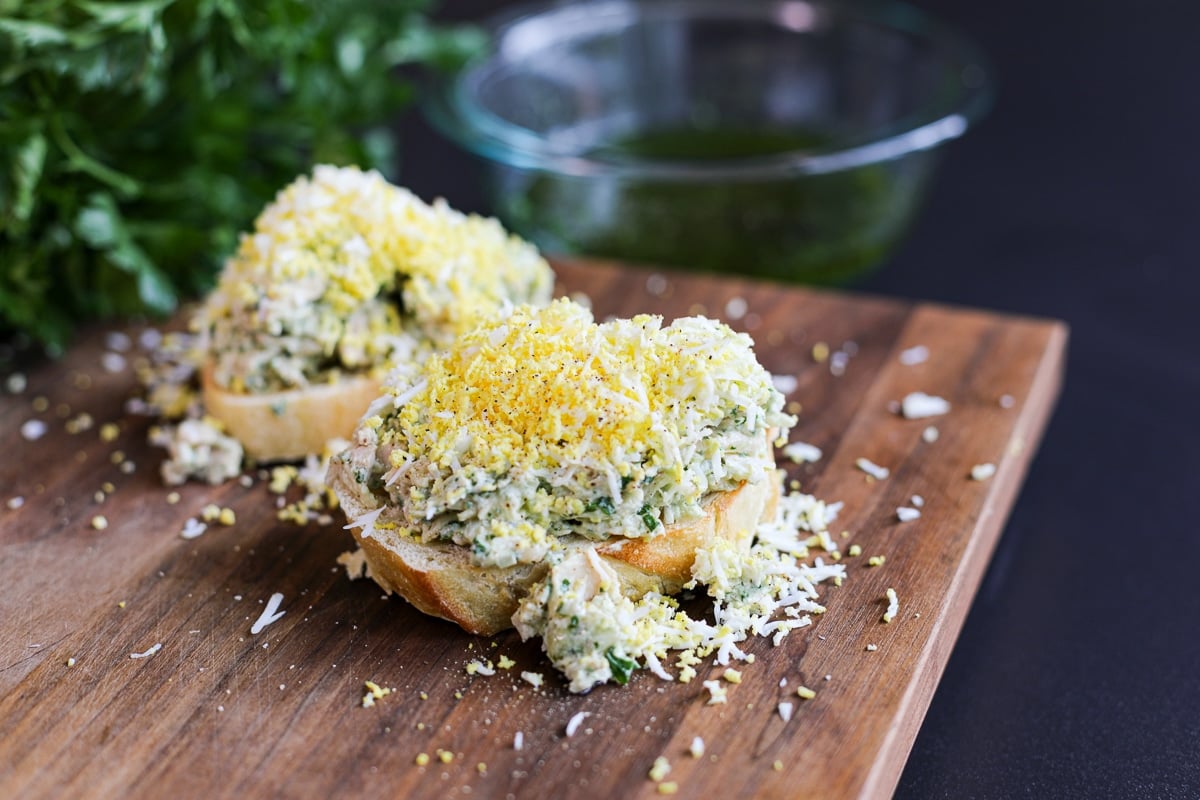 smashed bean tuna salad with chimichurri and grated egg. 