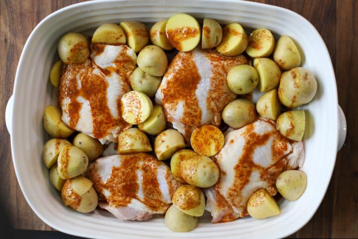 sauced drizzled over raw chicken and potatoes.