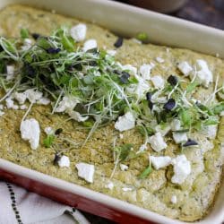close shot of pesto baked eggs.
