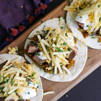 steak tacos on a platter.