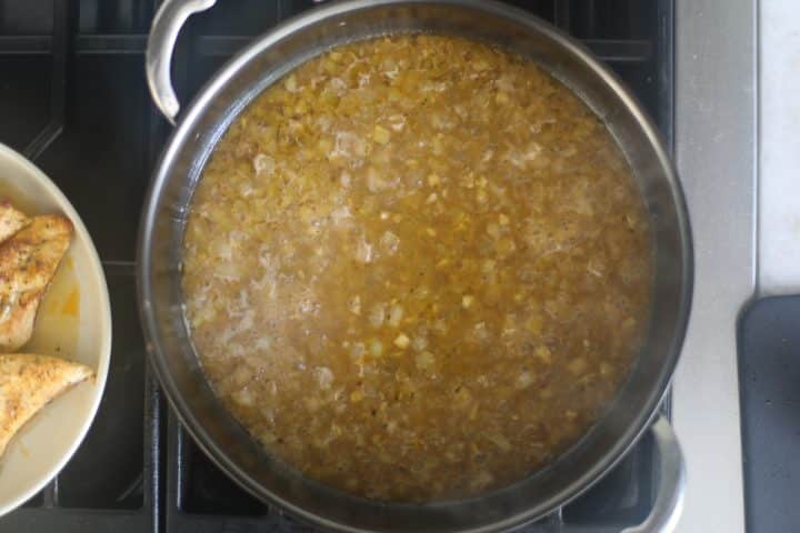 onions, garlic and broth in a pan.