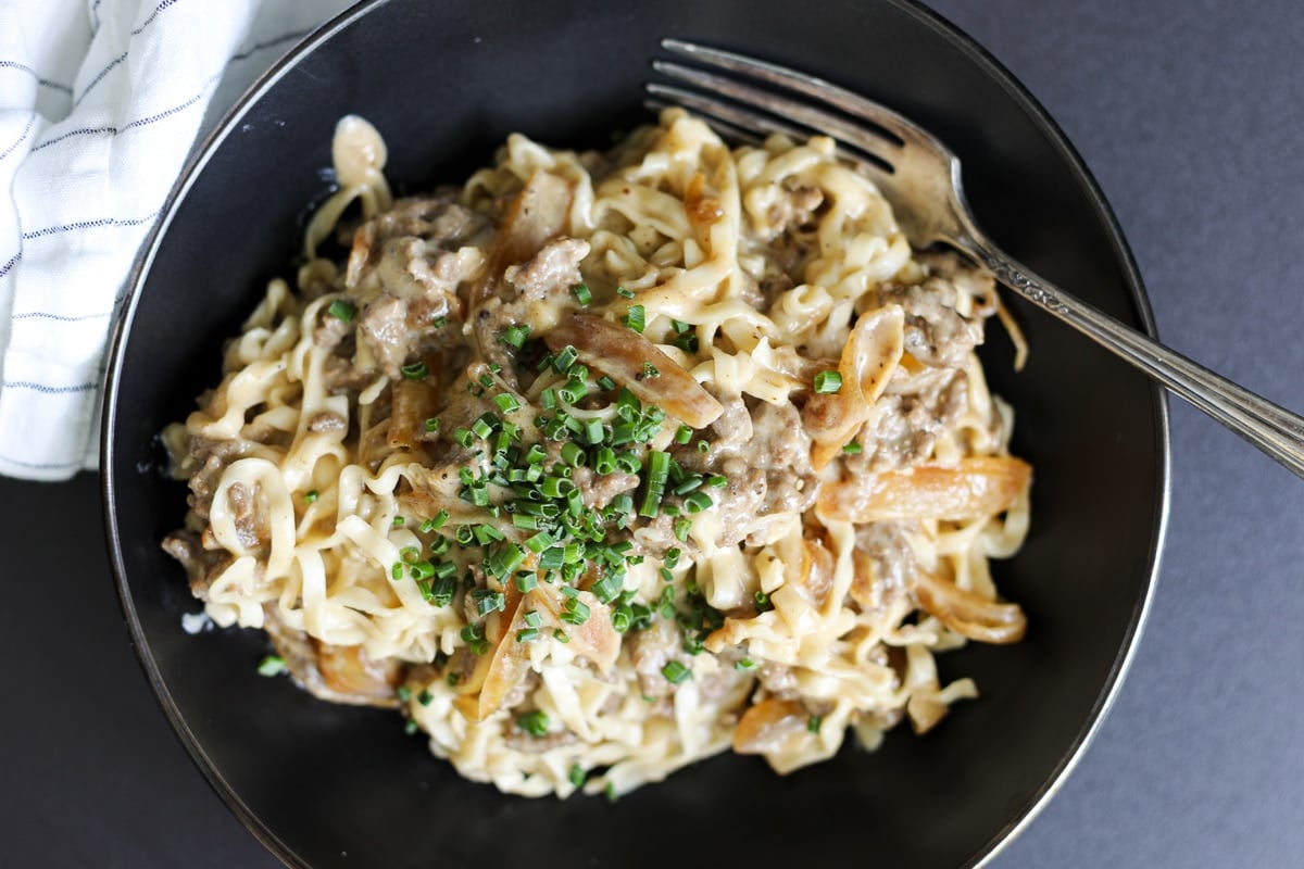 cheesy beef noodles in a bowl. 