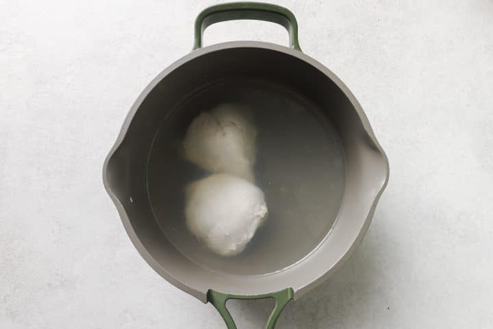boiled chicken in a pot. 